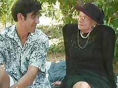 GRANNY AWARD 5 flaxen-haired  mature with a dear boy outdoor