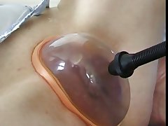 French mature gets a large dildo into her pumped pussy